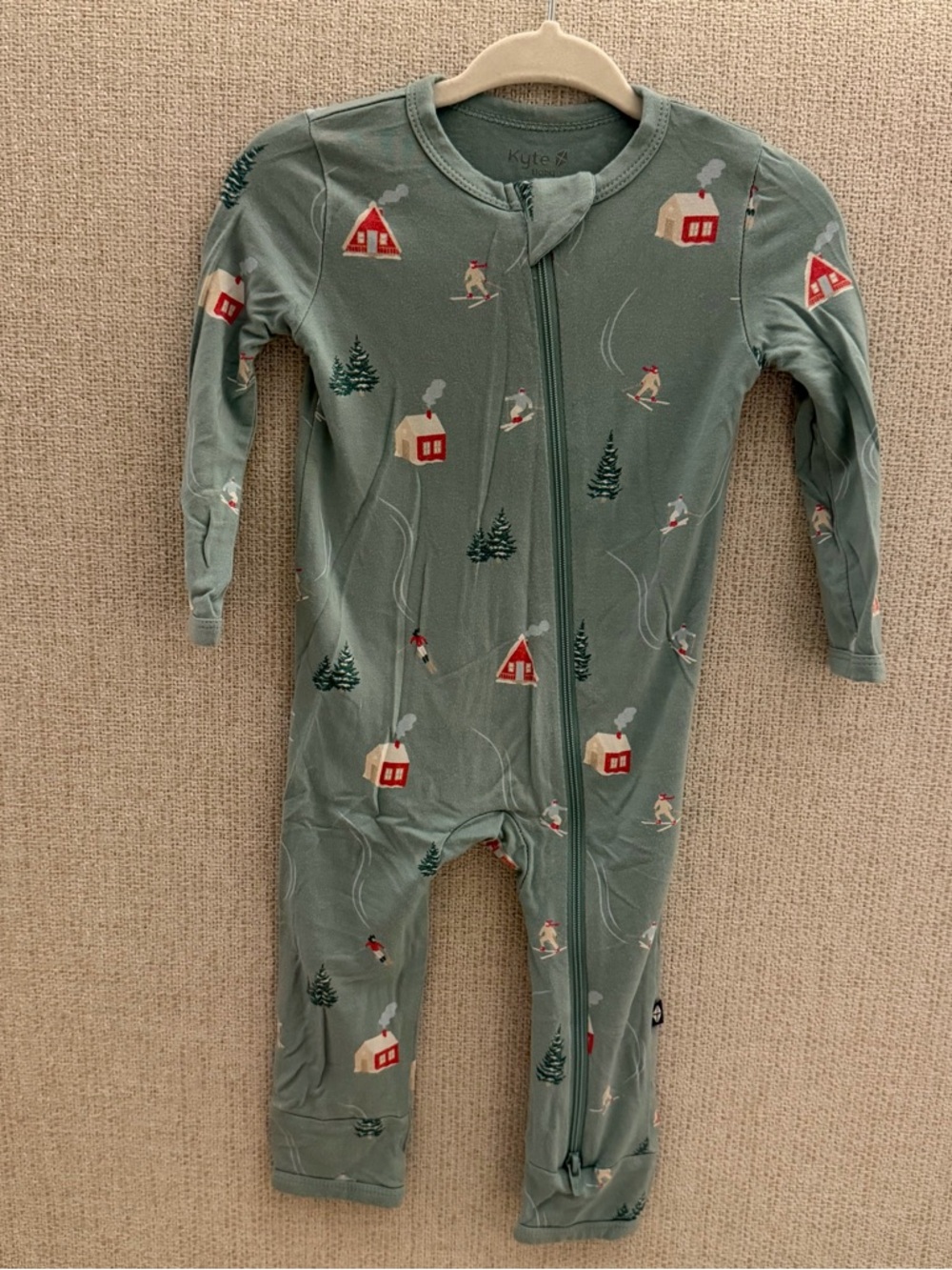 Kyte BABY Green Ski Cabin Print One-Piece